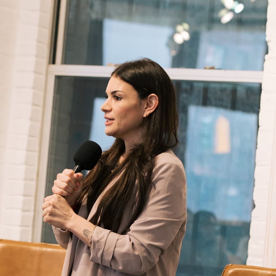 Vix Reitano speaking to an audience